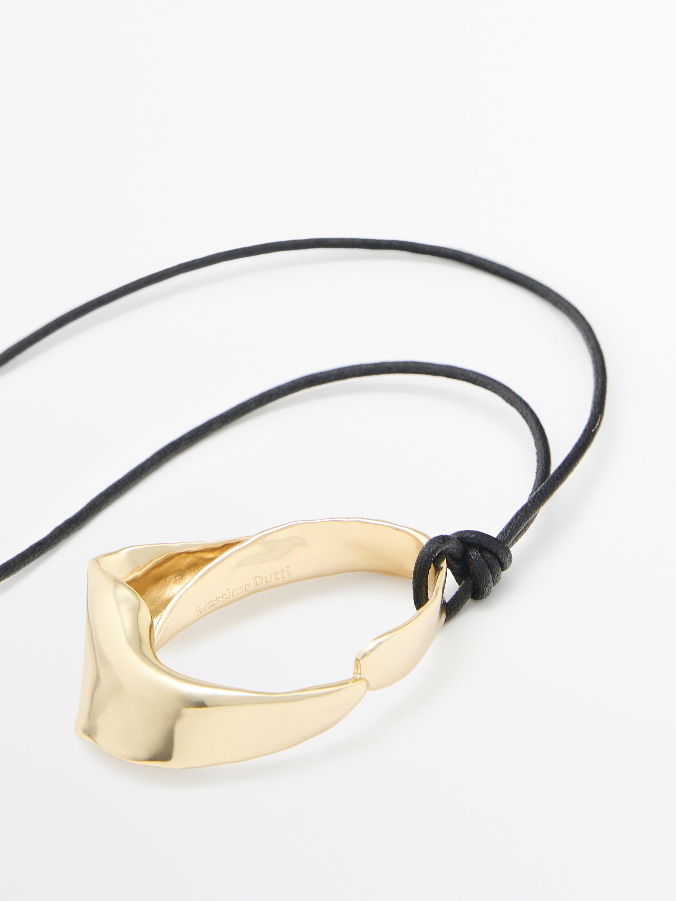 Leather cord necklace with irregular pendant